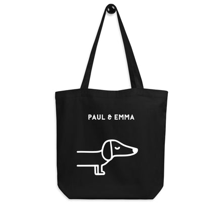 Schwarze Bio-Stofftasche mit weißem Dackel-Motiv und Paul Emma Logo - nachhaltige Hundetasche